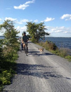 Brandon and Kona riding down the Island Line Trail